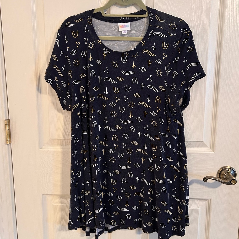 LuLaRoe “Erika” Navy and Gold Patterned Short Sleeve Top